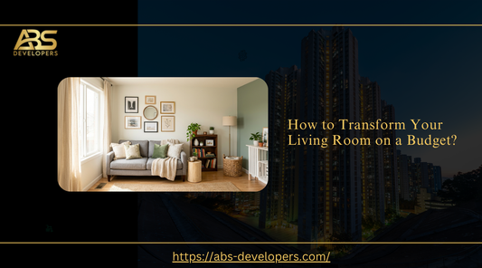 ABS Developers: How to Transform Your Living Room on a Budget? Cozy interior with a grey sofa.